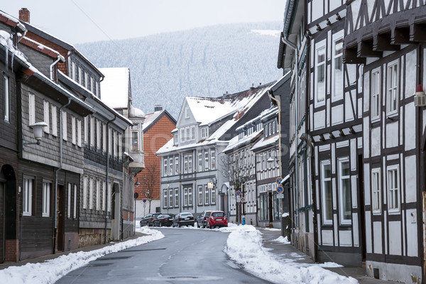 Street with half-timbered houses with snowfall Stock photo © w20er