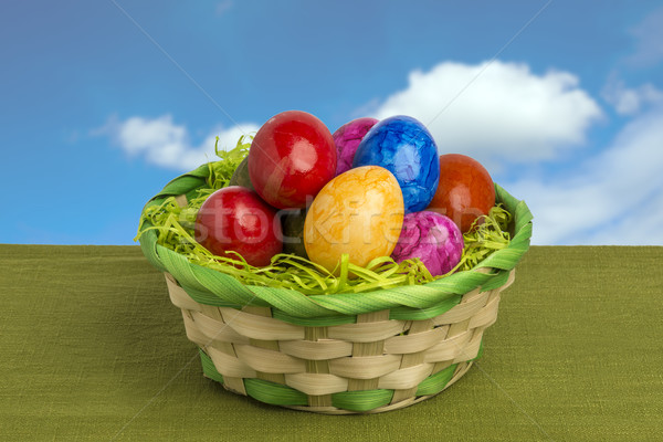 Pâques panier oeufs colorés ciel bleu blanche nuages [[stock_photo]] © w20er