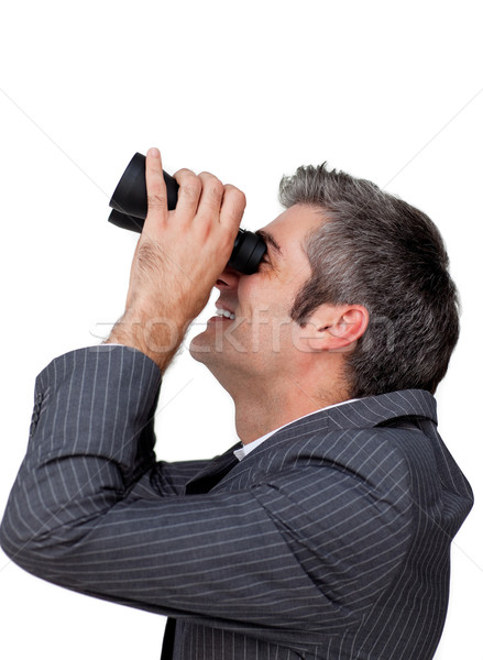 Visionary businessman looking through a pair of binoculars Stock photo © wavebreak_media
