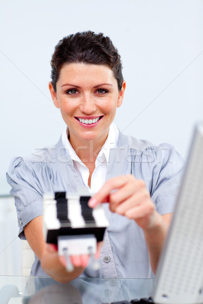Zakenvrouw telefoon zoeken kantoor boek contact Stockfoto © wavebreak_media