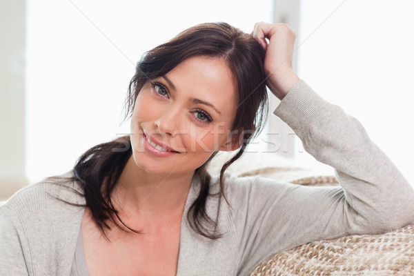 Gorgeous woman posing in a living room Stock photo © wavebreak_media