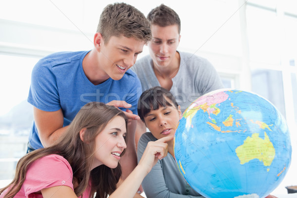 Quatre souriant élèves autour monde deux [[stock_photo]] © wavebreak_media