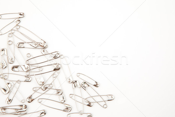 Grey paperclips against a  white background Stock photo © wavebreak_media