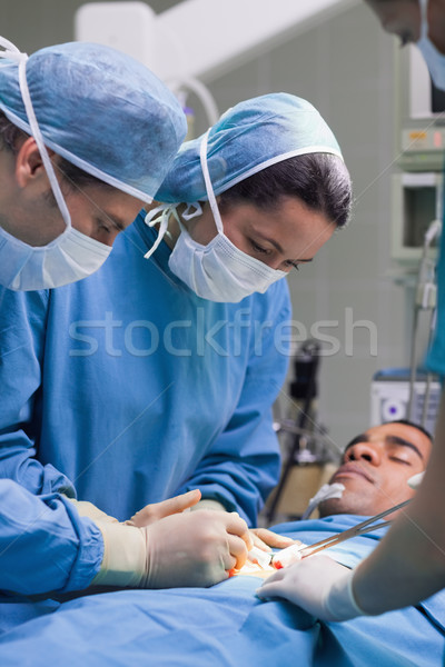 Grave medici guardando paziente ospedale donna Foto d'archivio © wavebreak_media