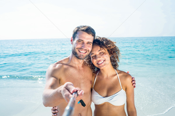 Happy couple doing selfie with monopod Stock photo © wavebreak_media