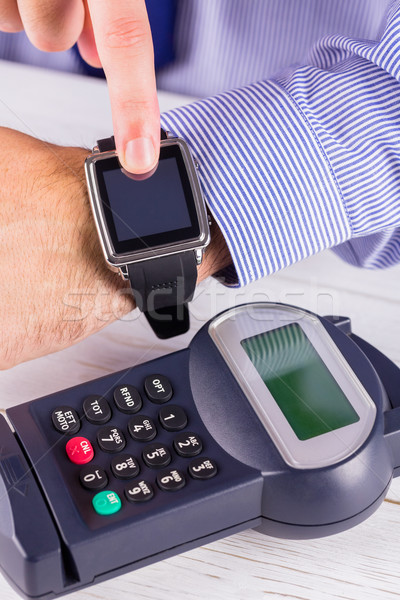 Man using smart watch to express pay  Stock photo © wavebreak_media