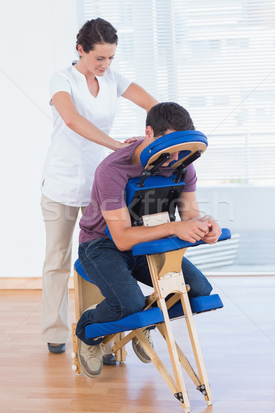Mann zurück Massage medizinischen Büro Frau Stock foto © wavebreak_media