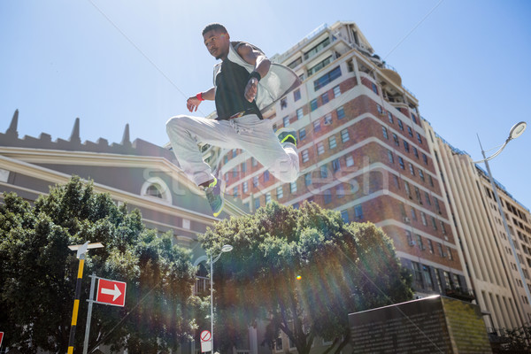 Athletic man doing parkour in the city Stock photo © wavebreak_media