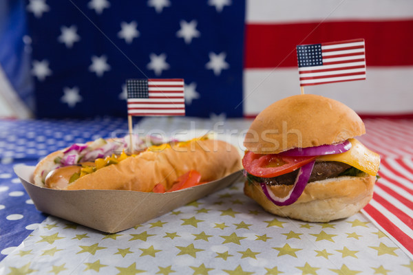 Burger and hot dog on wooden table with 4th july theme Stock photo © wavebreak_media