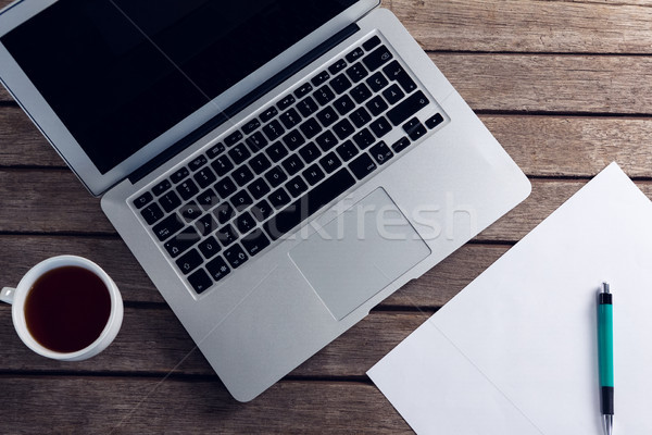 ноутбука черный кофе чистый лист бумаги деревянный стол интернет пер Сток-фото © wavebreak_media