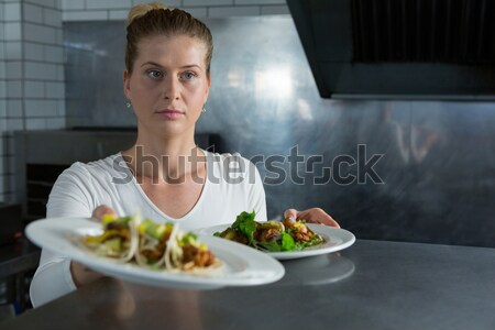 Female chef using digital tablet Stock photo © wavebreak_media