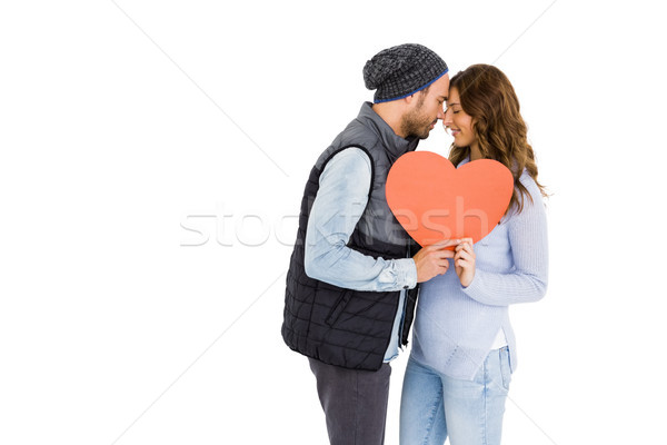 Stock photo: Happy young couple holding heart