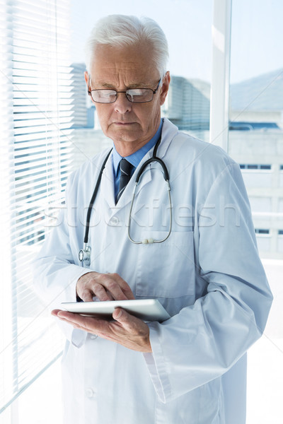 Doctor using digital tablet Stock photo © wavebreak_media