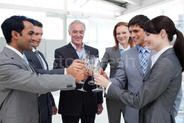 Foto stock: Alegre · equipo · de · negocios · champán · celebrar · éxito