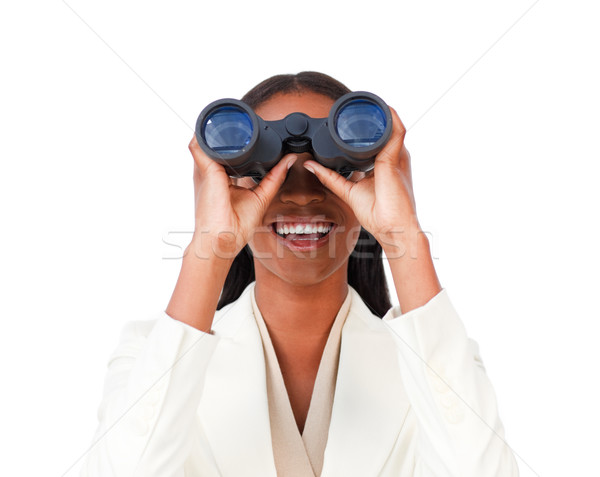 Visionary businesswoman looking through binoculars  Stock photo © wavebreak_media