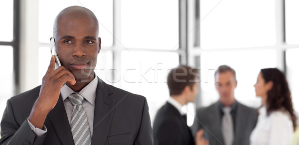 Businessman talking on cellphone Stock photo © wavebreak_media