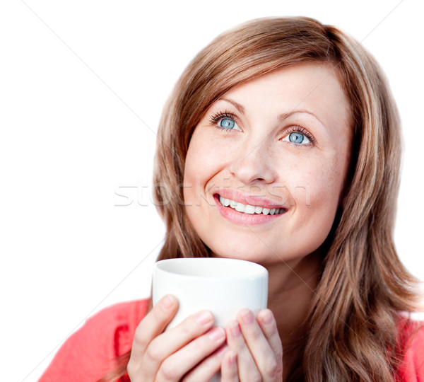 Bright woman holding a cup of coffee Stock photo © wavebreak_media