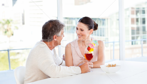 Happy couple drinking a glass in a bar Stock photo © wavebreak_media