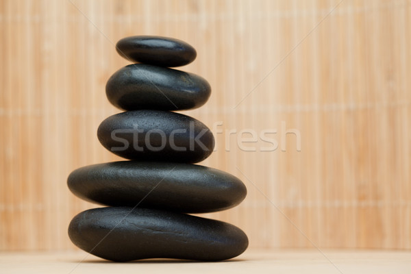 Many piled up pebbles on a brown background Stock photo © wavebreak_media
