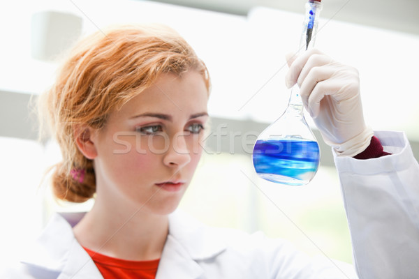 Science student mixing liquids in a laboratory Stock photo © wavebreak_media