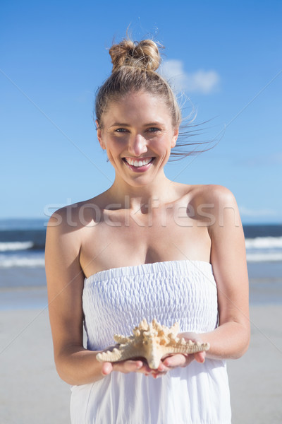 Bastante vestido blanco estrellas de mar playa Foto stock © wavebreak_media