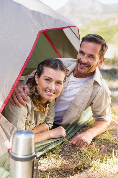 [[stock_photo]]: Couple · souriant · caméra · à · l'intérieur · tente