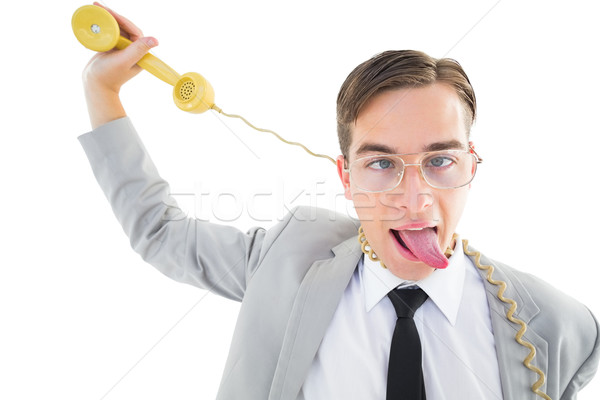 Geeky businessman being strangled by phone cord Stock photo © wavebreak_media