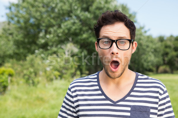 Handsome hipster looking surprised Stock photo © wavebreak_media