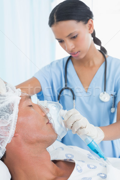 Lekarza maska ​​tlenowa szpitala kobieta człowiek medycznych Zdjęcia stock © wavebreak_media