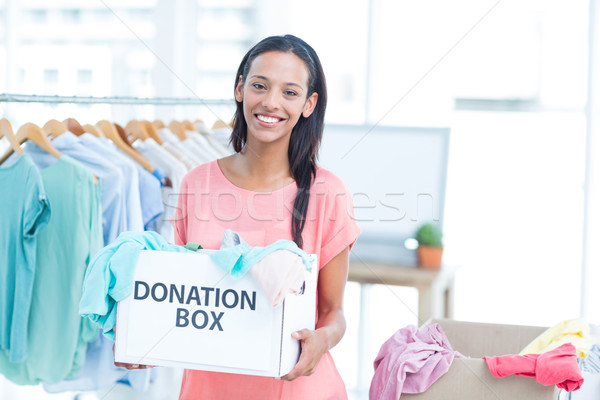 Uśmiechnięty polu darowizny wolontariusz biuro Zdjęcia stock © wavebreak_media