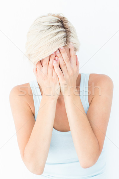 Triste femme blonde pleurer tête mains blanche [[stock_photo]] © wavebreak_media