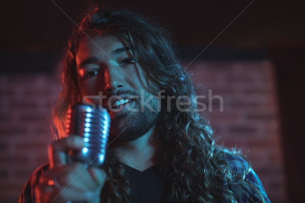 Mężczyzna piosenkarka nightclub muzyki Zdjęcia stock © wavebreak_media