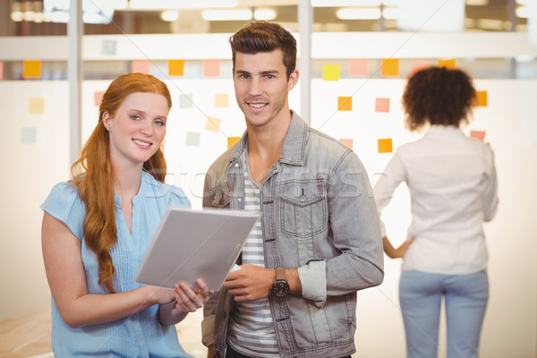 Portrait gens d'affaires regarder document souriant Homme [[stock_photo]] © wavebreak_media