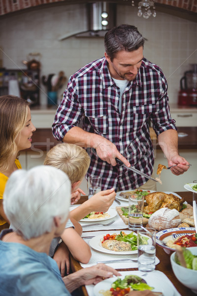 Stockfoto: Vader · voedsel · permanente · eettafel · familie