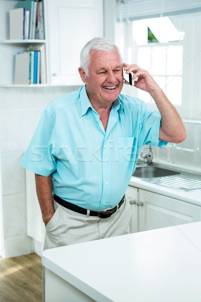 Mosolyog idős férfi beszél telefon otthon Stock fotó © wavebreak_media