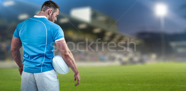Composite image of rugby player standing with ball Stock photo © wavebreak_media