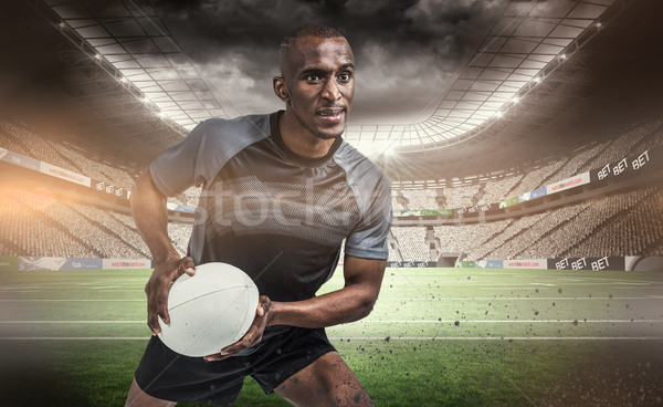 Composite image of rugby player in position to throw ball Stock photo © wavebreak_media