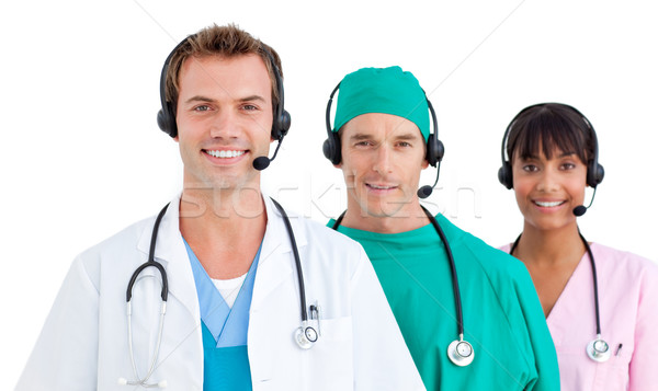 Self-assured three doctors smiling Stock photo © wavebreak_media