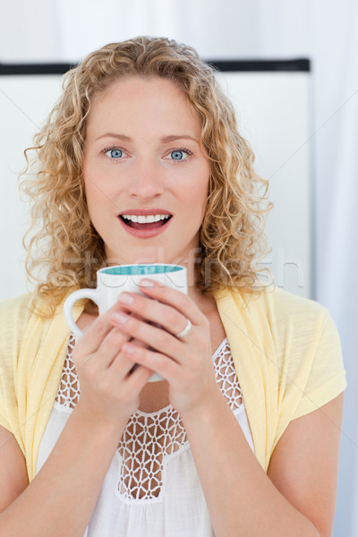 Hübsche Frau trinken Tee Küche home Frau Stock foto © wavebreak_media