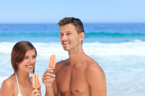 Pareja comer helado cielo verano océano Foto stock © wavebreak_media