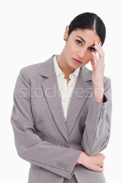 Young tradeswoman looking sad against a white background Stock photo © wavebreak_media