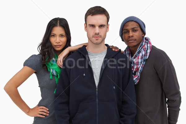 Fashionable young friends looking at camera Stock photo © wavebreak_media