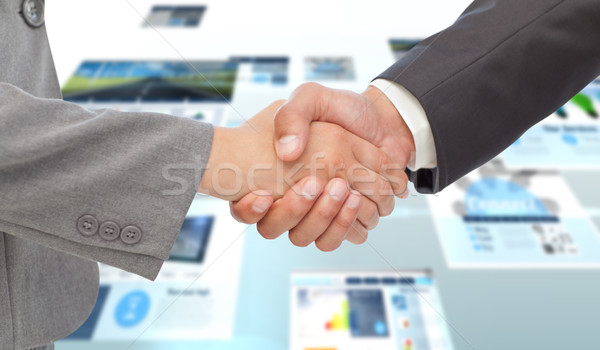 Composite image of handshake between two business people Stock photo © wavebreak_media