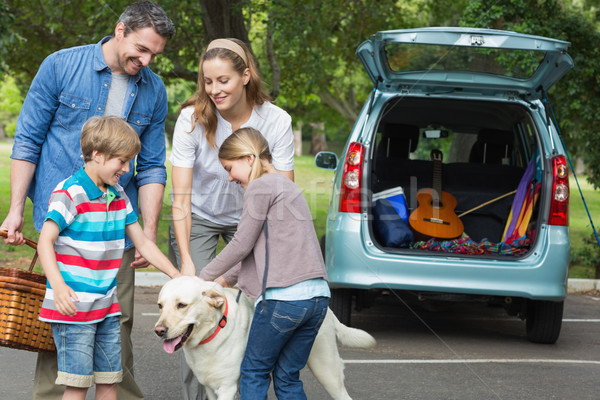 Family with kids and pet dog at picnic Stock photo © wavebreak_media