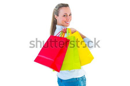 Lächelnd halten Einkaufstaschen weiß Frau Stock foto © wavebreak_media