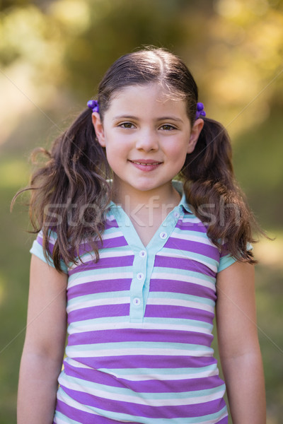 Lächelnd kleines Mädchen stehen Wald Porträt glücklich Stock foto © wavebreak_media