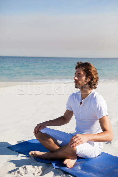 Homem · ioga · praia · fitness - foto stock © wavebreak_media (#8317571)