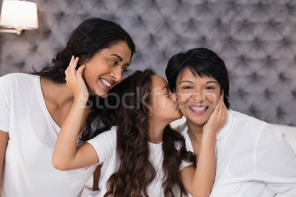 Girl loving mother and grandmother in bedroom Stock photo © wavebreak_media