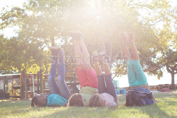 Stock photo: Children exercising at park