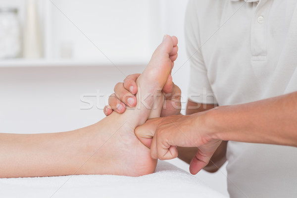 Stock photo: Woman having foot massage 